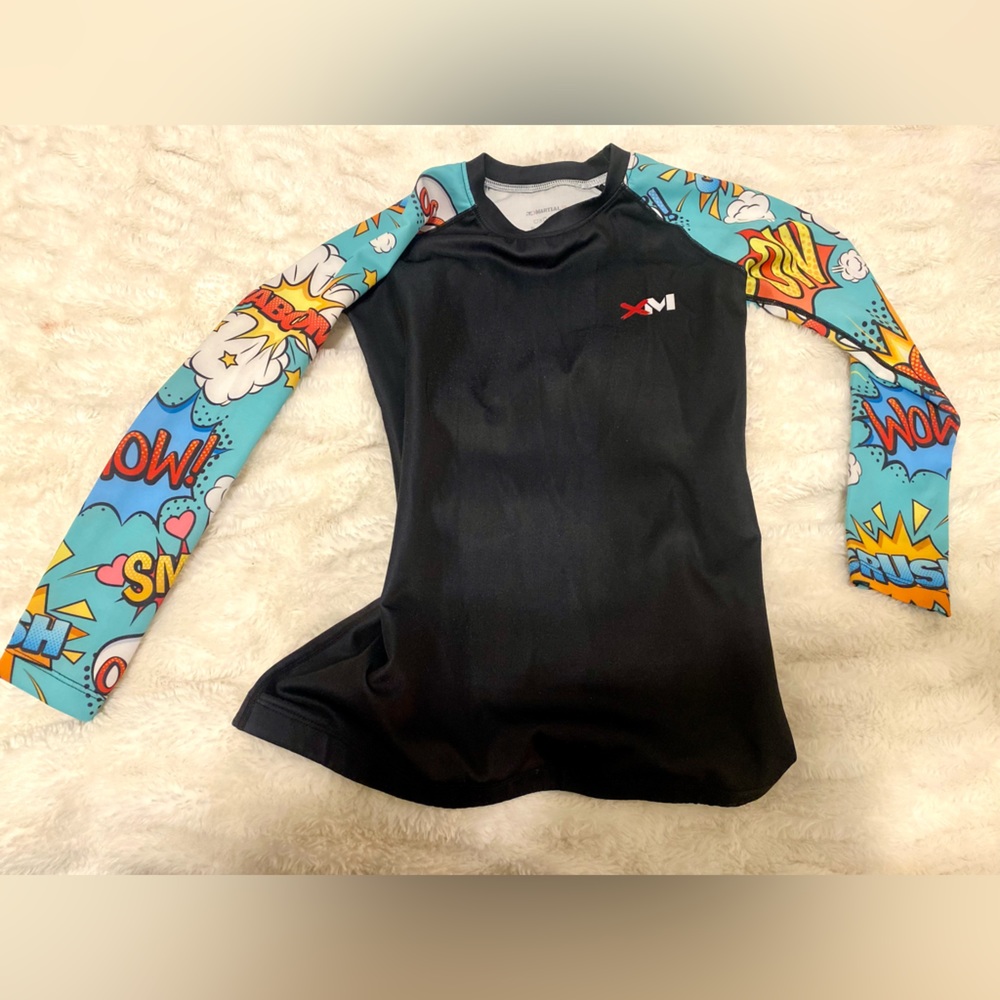 XMartial Womens’ Comic Hero BJJ Rashgaurd